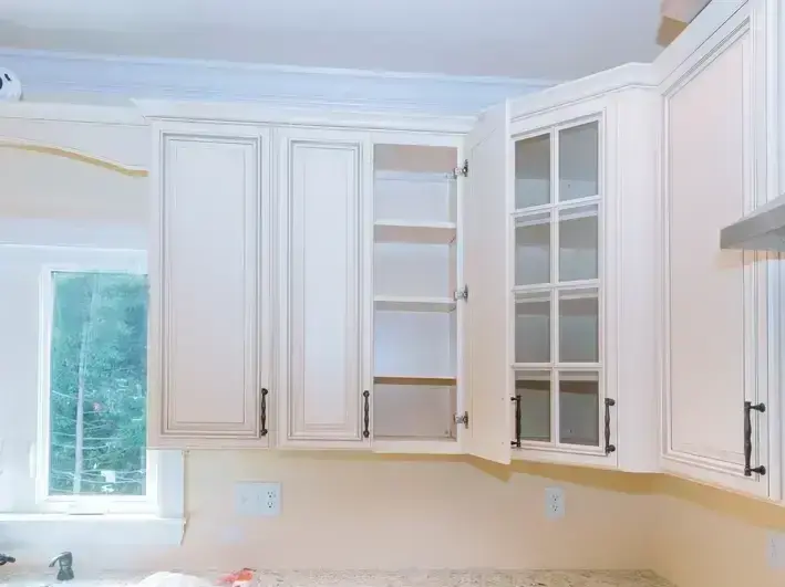 cabinet painting service in Lake Burien home with smooth sprayed finish